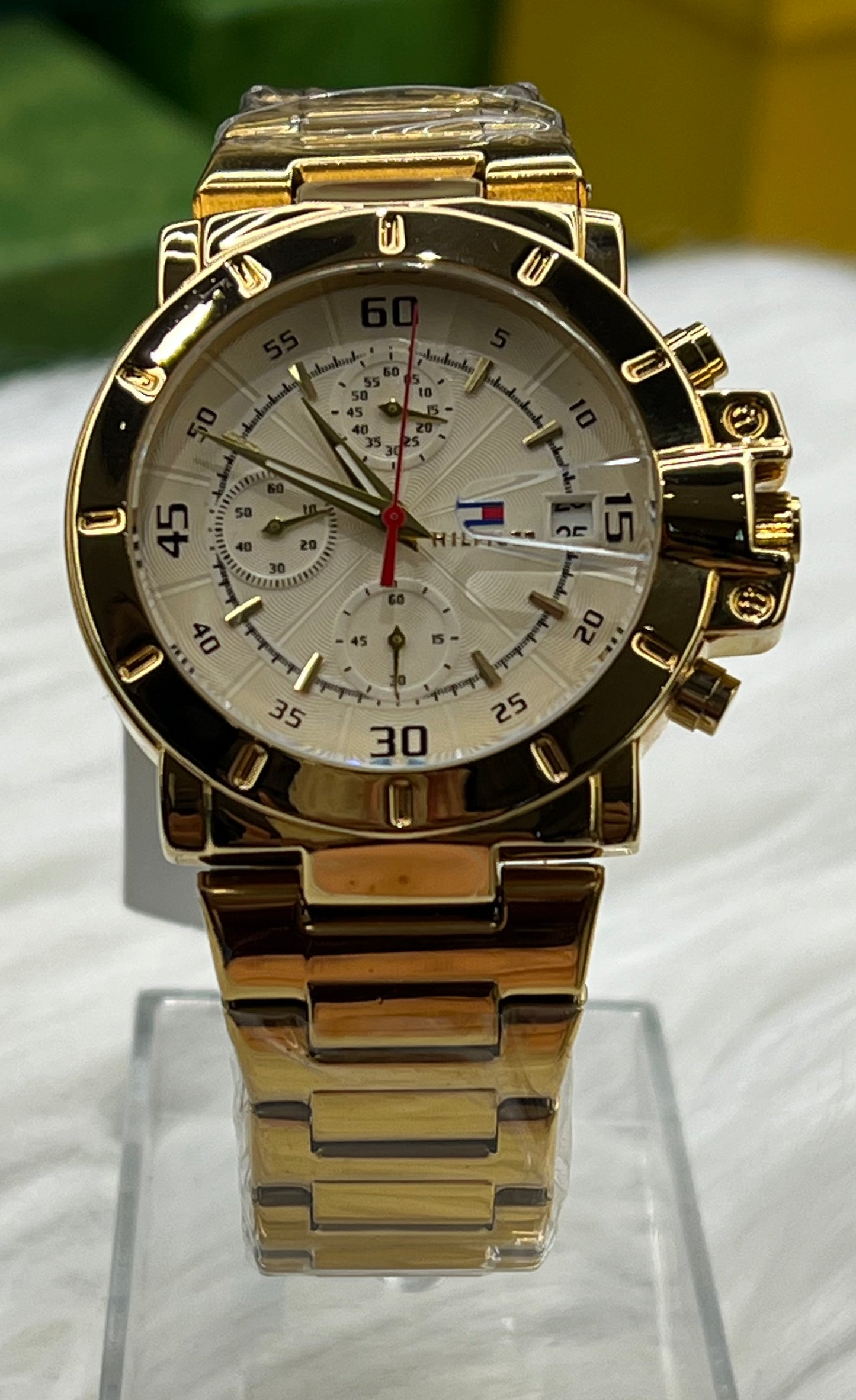 ECONOMICAL WRIST WATCH TOMMY HIL GOLDEN