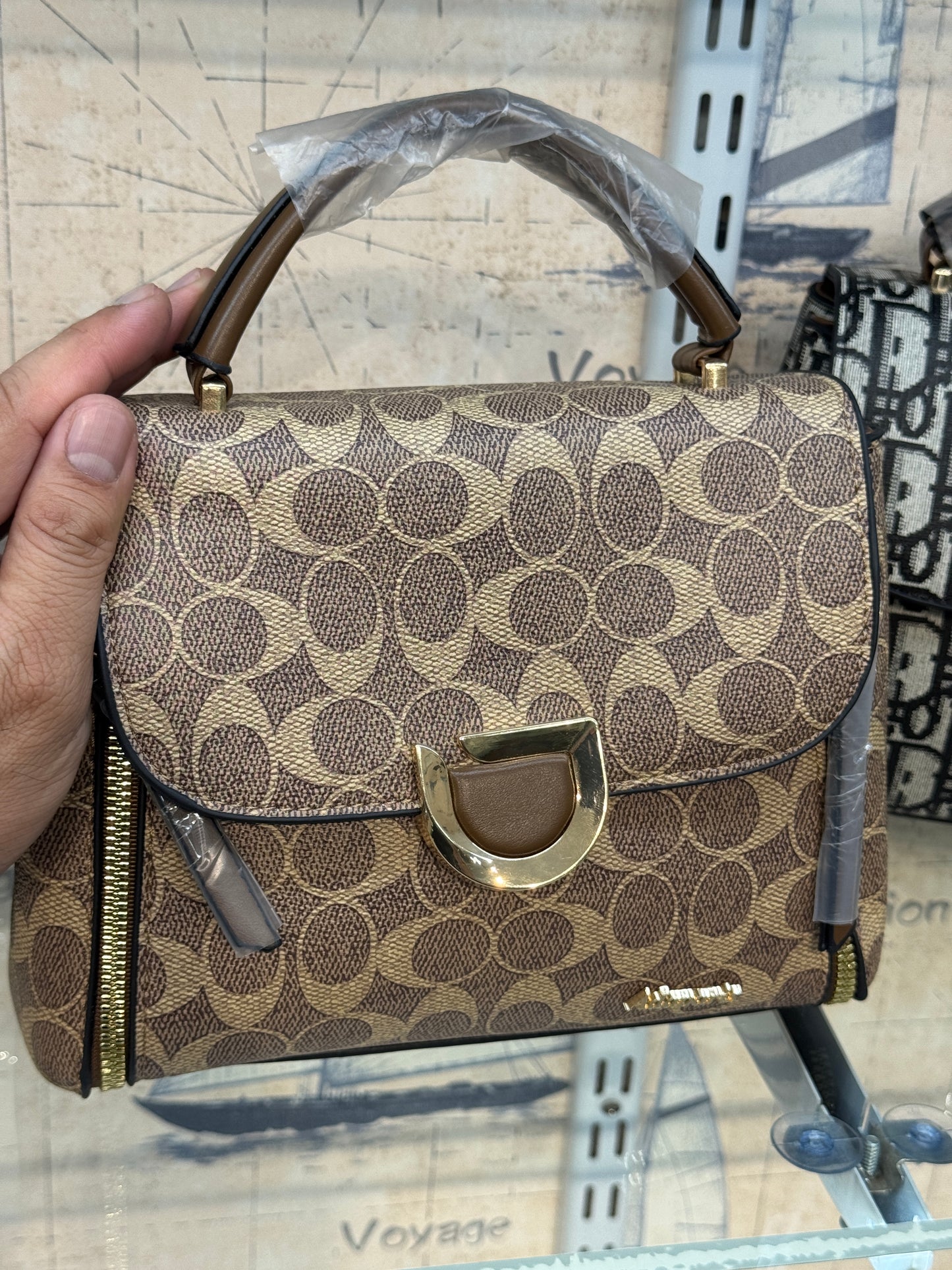 ECONOMICALS COACH HANDBAG WITH SLING