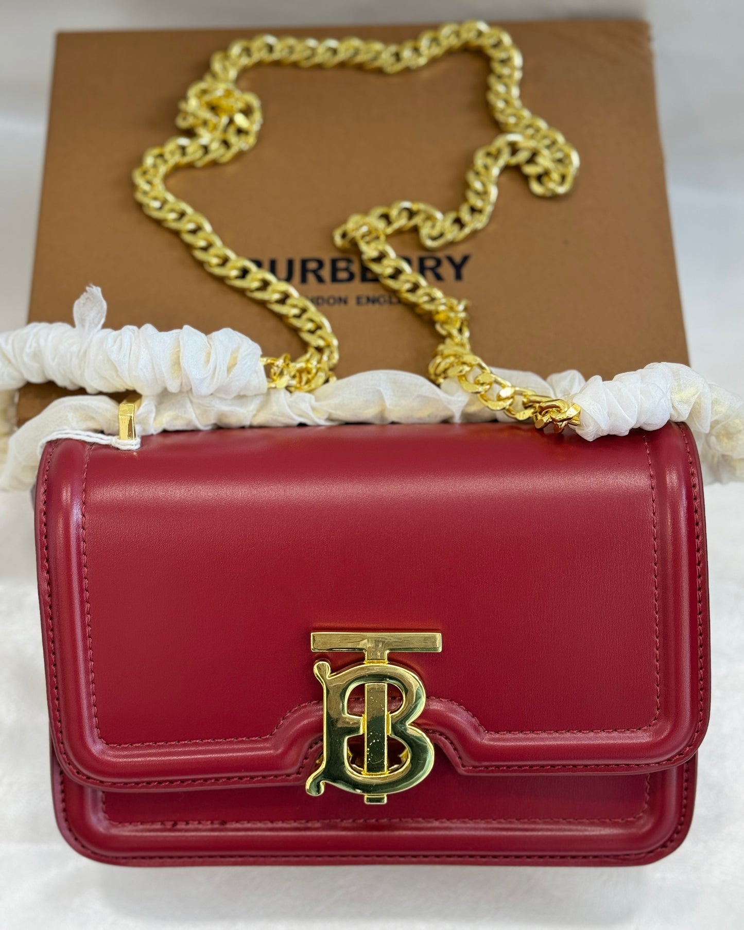 BURBERRY  RED SLING BAG ( WITH BOX )