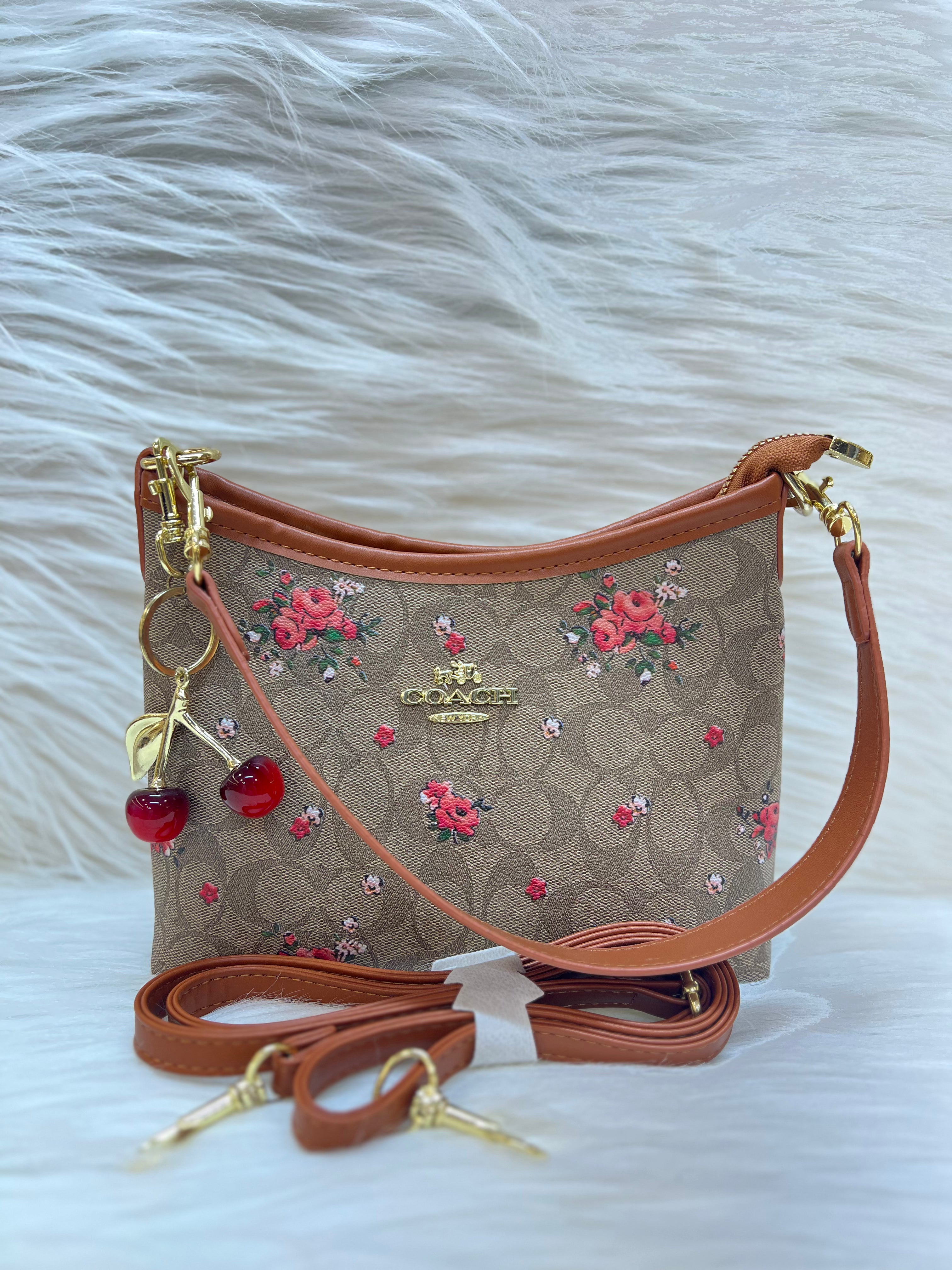 COACH FLORAL SLING BAG TBS-000272