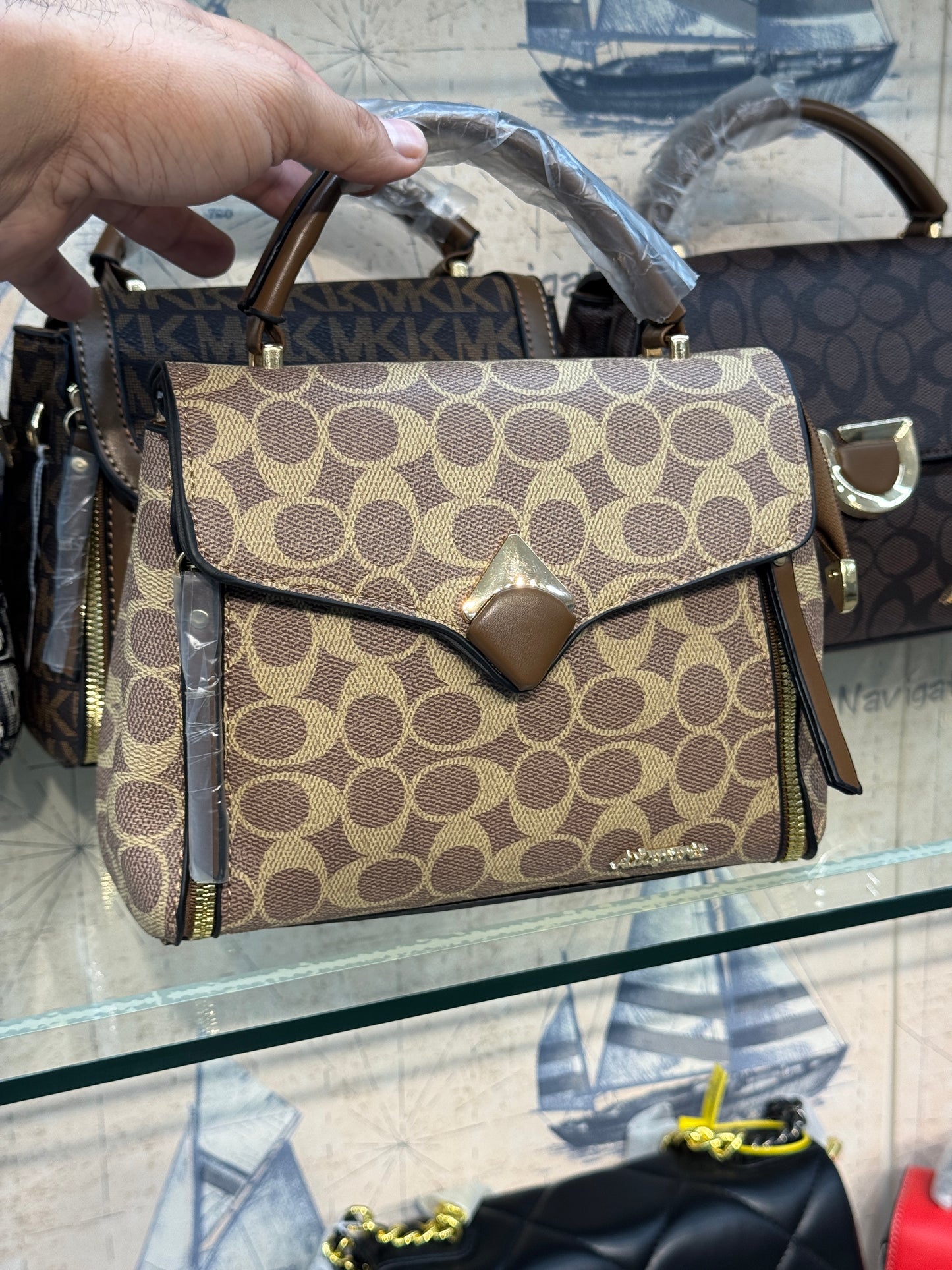 ECONOMICALS COACH HANDBAG WITH SLING