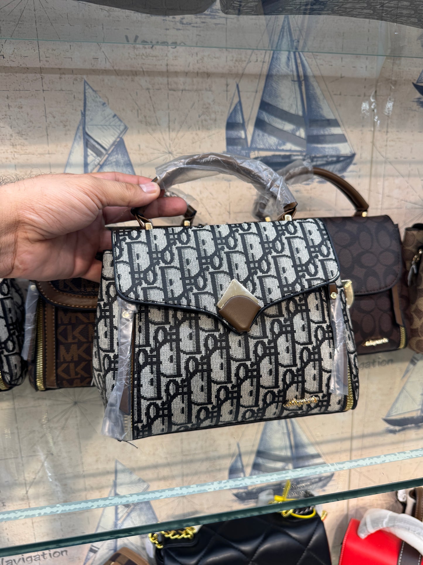 ECONOMICALS COACH HANDBAG WITH SLING