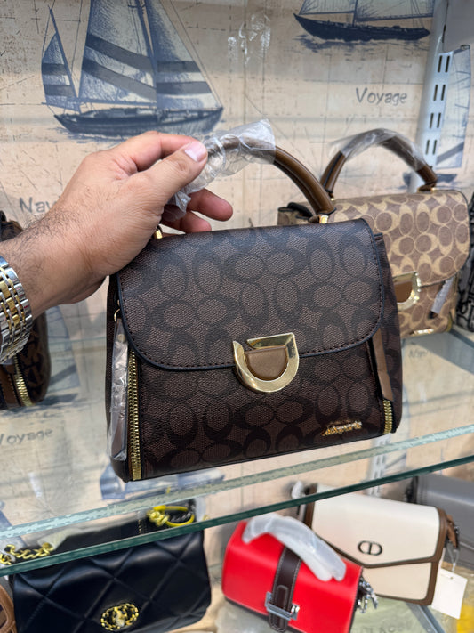 ECONOMICALS COACH HANDBAG WITH SLING