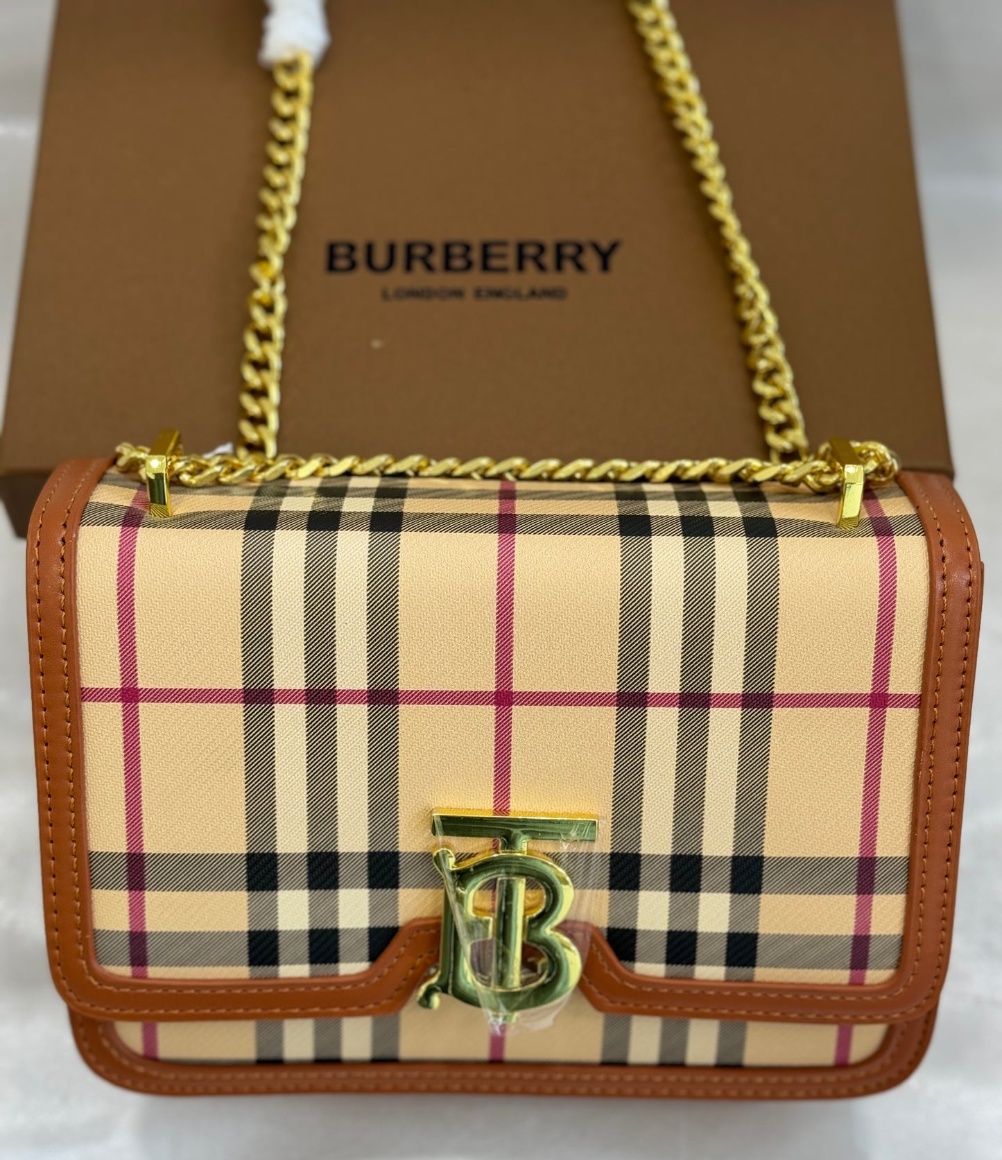 BURBERRY BROWN PATTERN SLING BAG ( WITH BOX )
