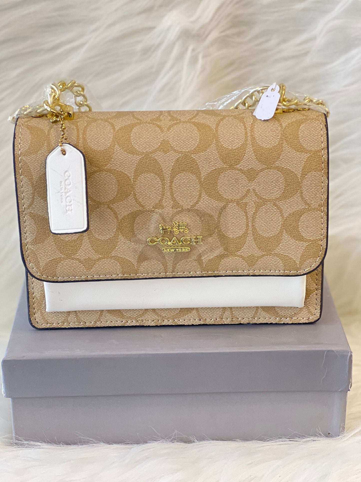 COAACH OFF WHITE COLOR SLING  BAG ( WITH BOX )